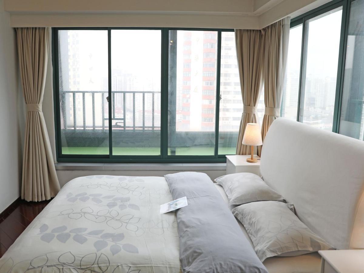 Shanghai Cosmo World Union Service Apartment Exteriör bild