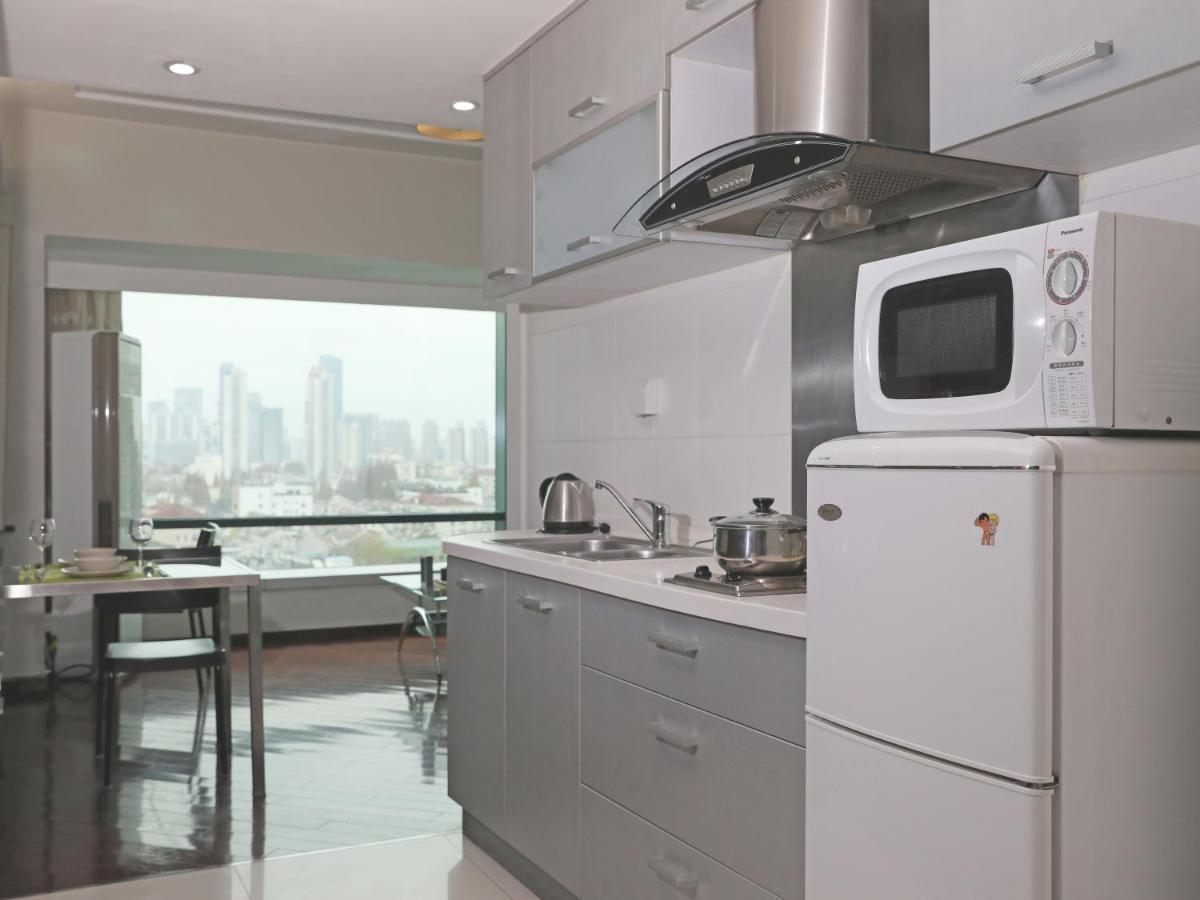 Shanghai Cosmo World Union Service Apartment Exteriör bild