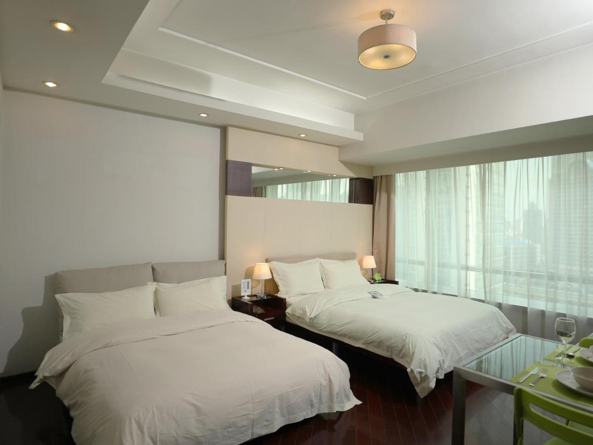 Shanghai Cosmo World Union Service Apartment Exteriör bild
