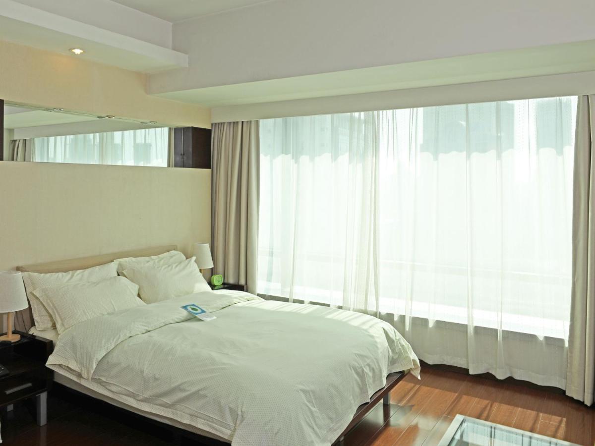Shanghai Cosmo World Union Service Apartment Exteriör bild