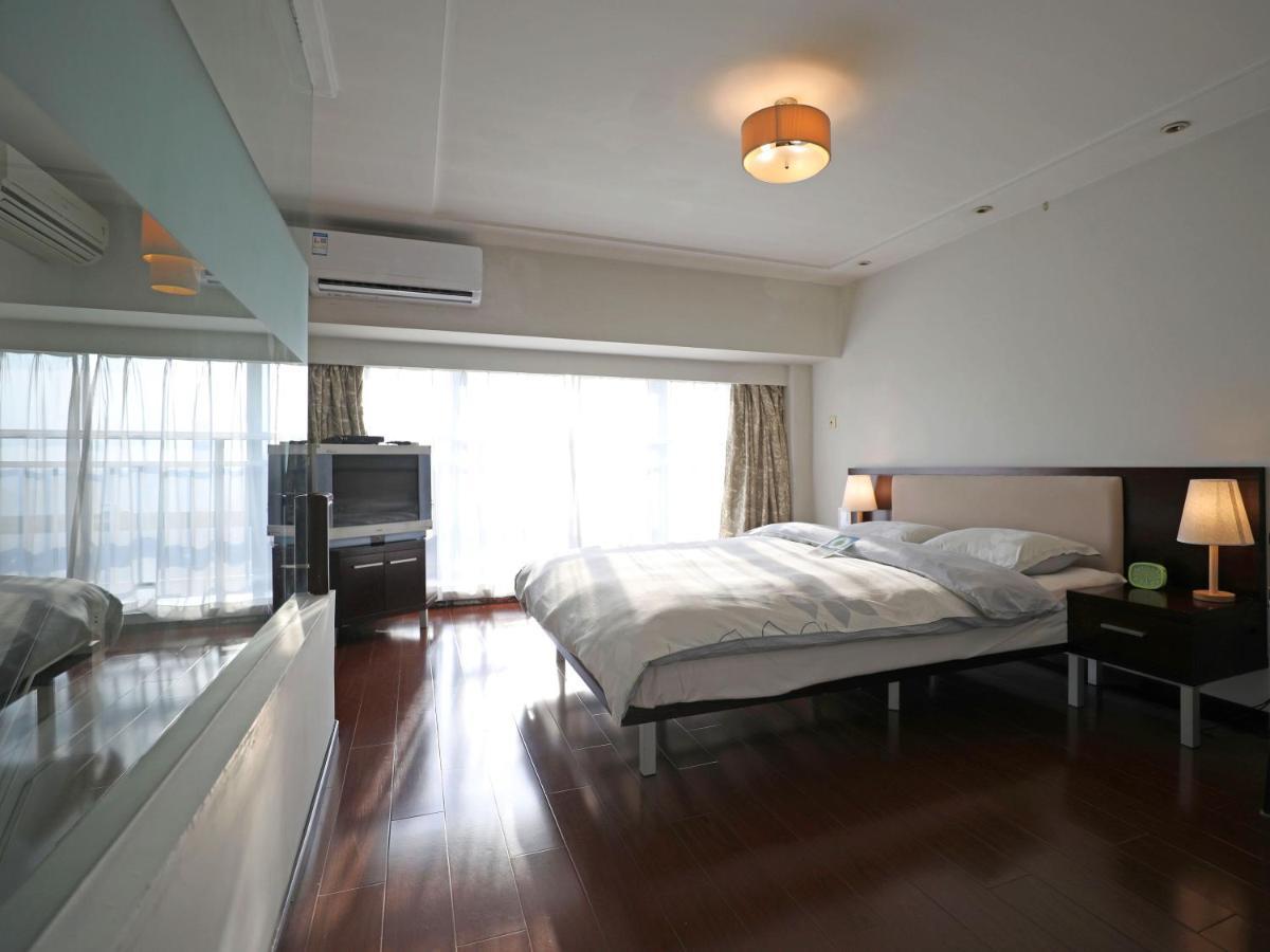 Shanghai Cosmo World Union Service Apartment Exteriör bild