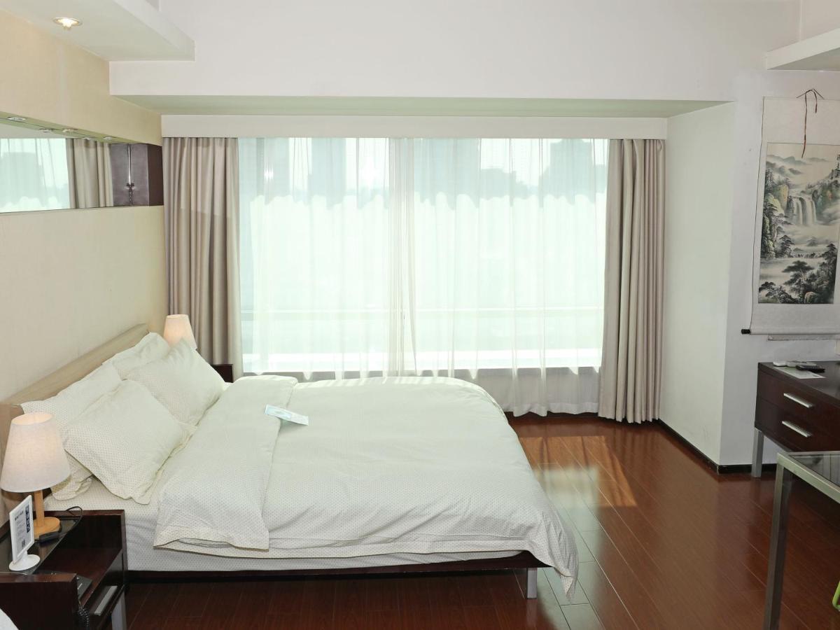 Shanghai Cosmo World Union Service Apartment Exteriör bild
