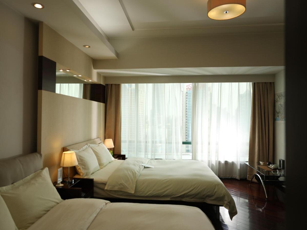 Shanghai Cosmo World Union Service Apartment Exteriör bild
