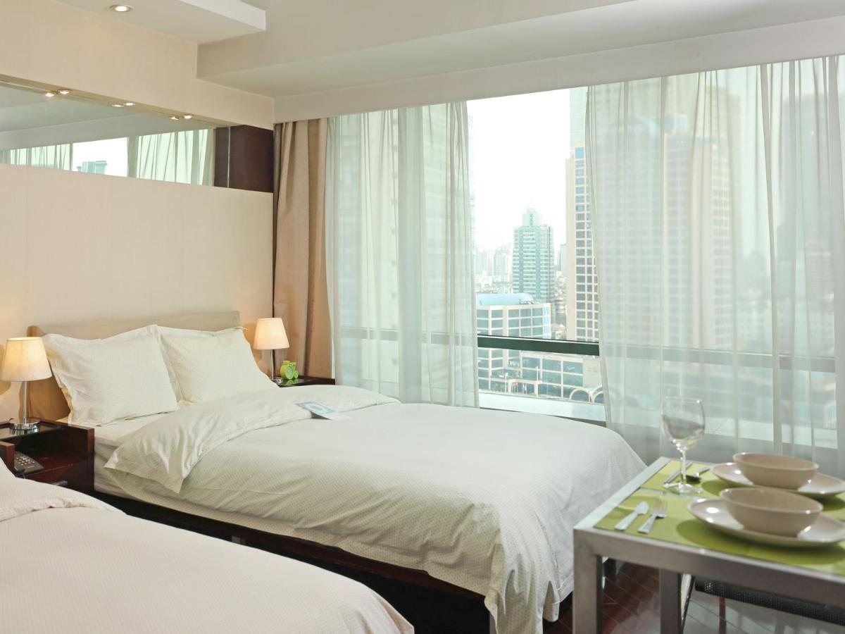 Shanghai Cosmo World Union Service Apartment Exteriör bild