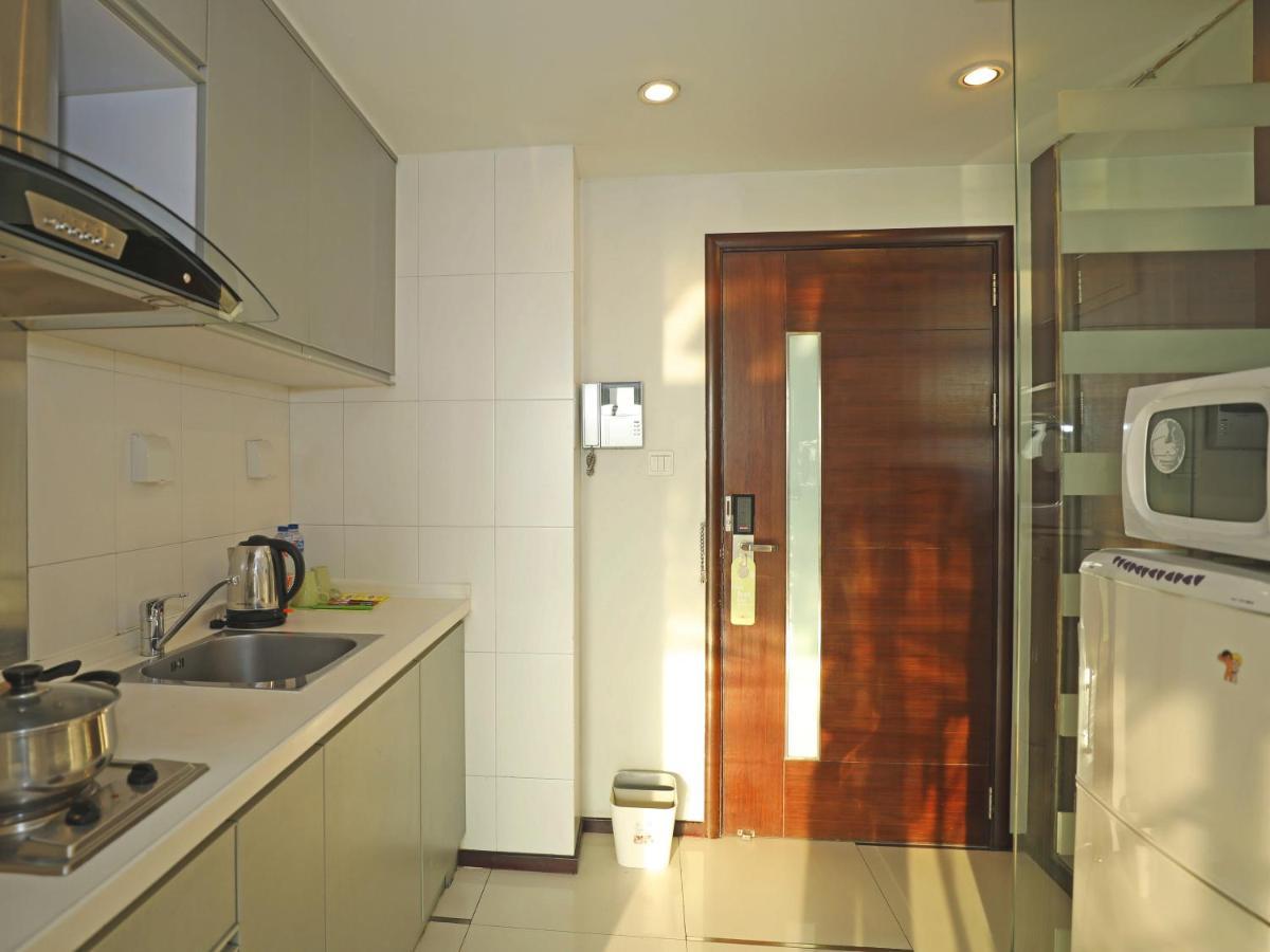 Shanghai Cosmo World Union Service Apartment Exteriör bild